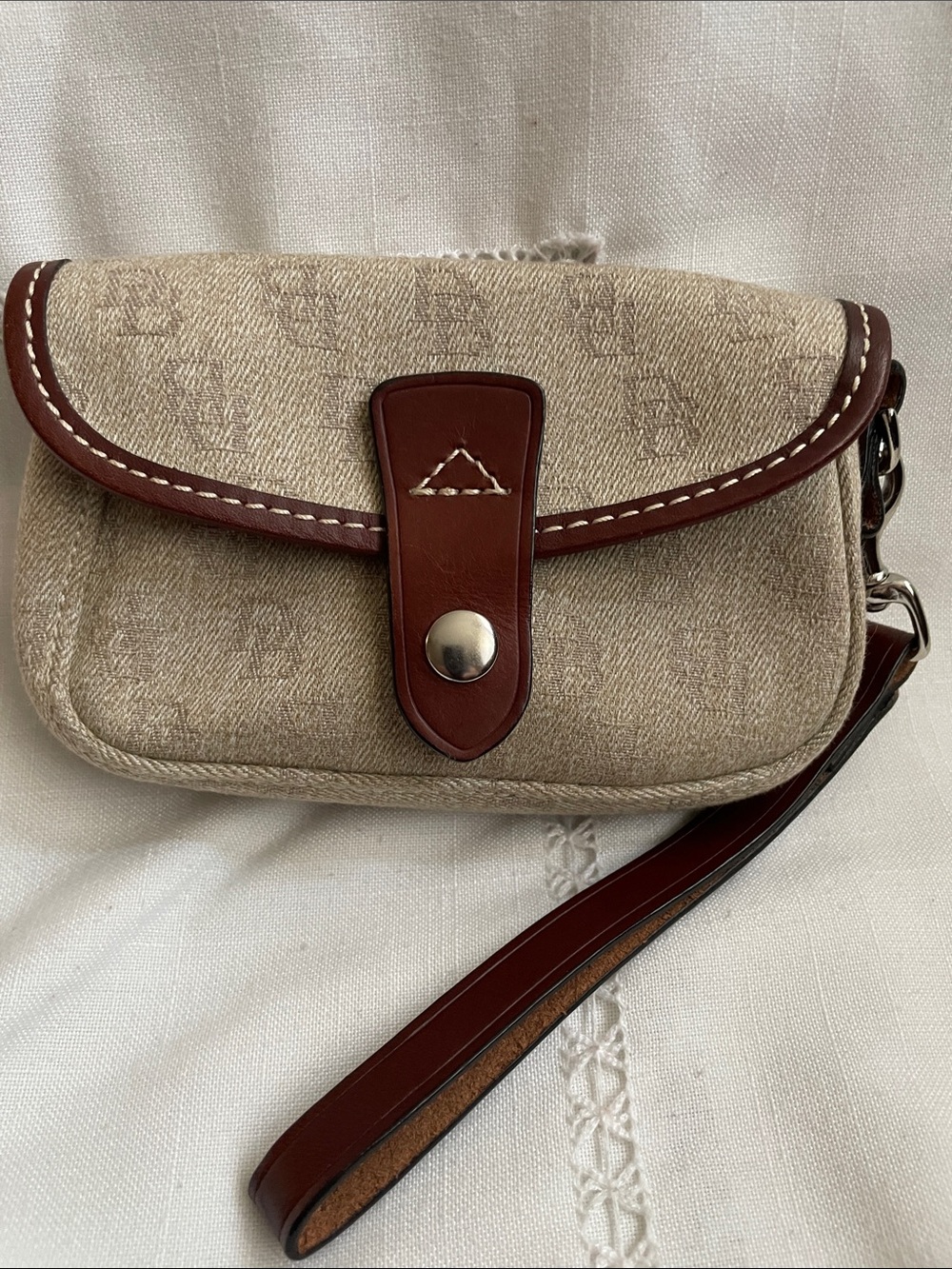 Dooney & Bourke Canvas  With Brown Leather Trim & Strap Wristlet EUC